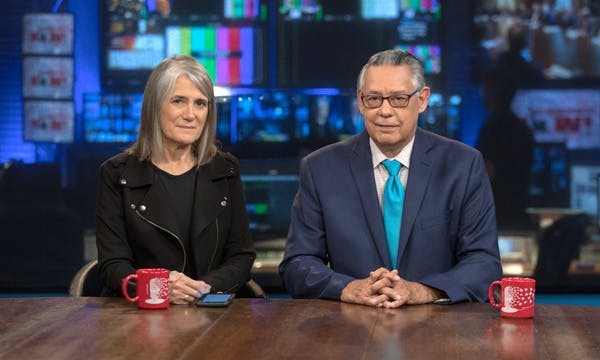 Photo of Democracy Now! news hosts Amy Goodman and Juan González